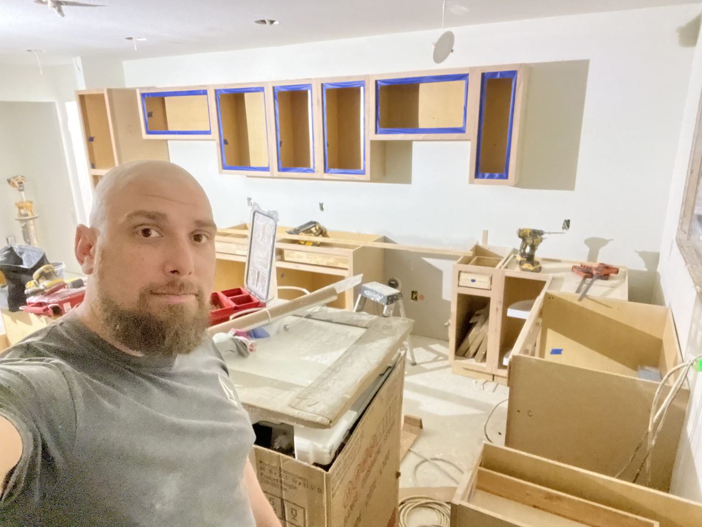 Setting cabinets during a kitchen remodel